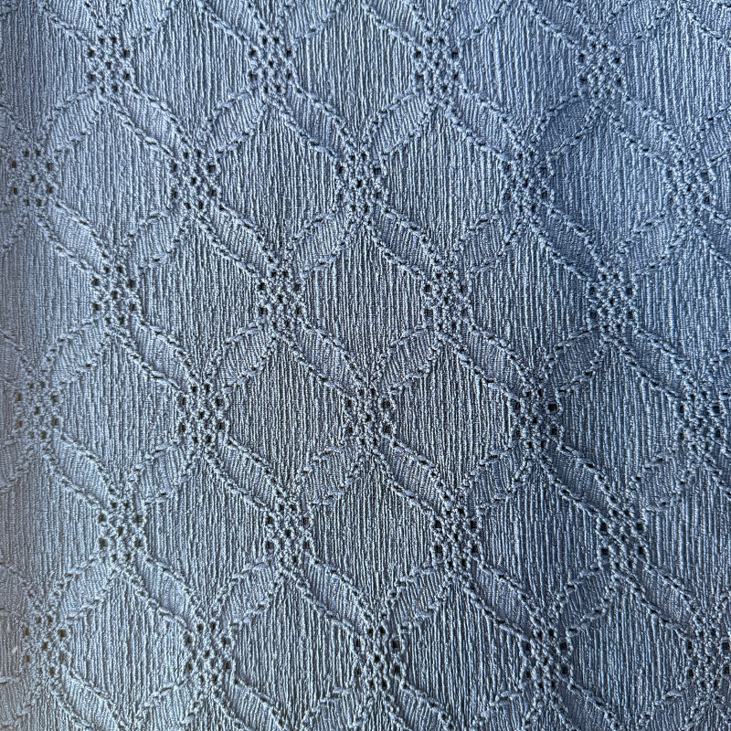 NO7002 Moderne kettinggebreide crêpestof met diamantpatroon