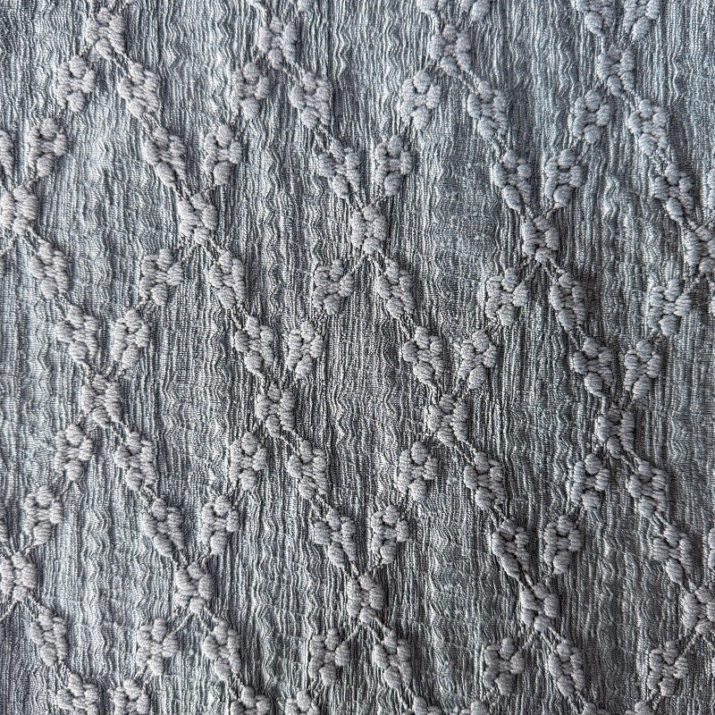 Wat maakt ademende gebreide stof ideaal voor kleding?